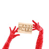 opera length red crushed velour gloves holding wooden Made in NYC sign