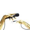opera length metallic gold vinyl gloves with microphone in left hand and aux cord in right hand