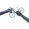 opera length reflective vinyl gloves with no flash holding a miniature bicycle