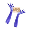 opera length purple velour gloves holding wooden Made in NYC sign