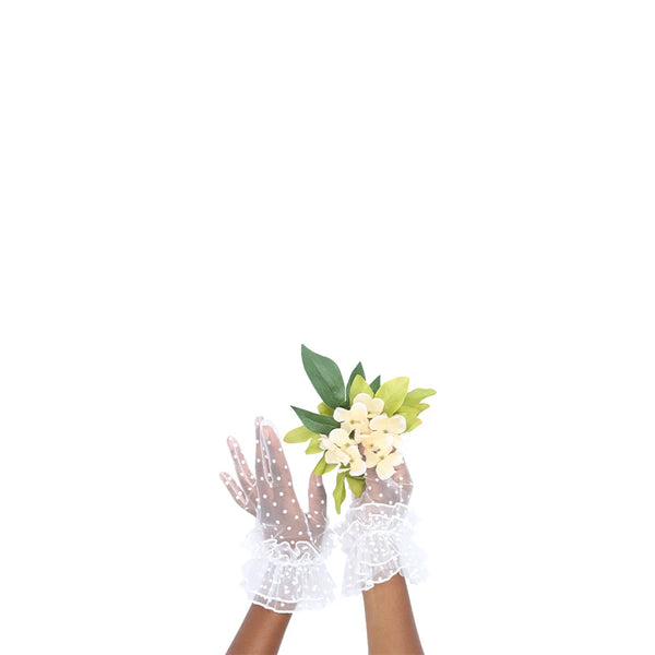 wrist length puffy white tulle gloves with accent white polka dots holding flowers in the right hand