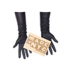 luxury black leather gloves holding wooden Made in NYC sign