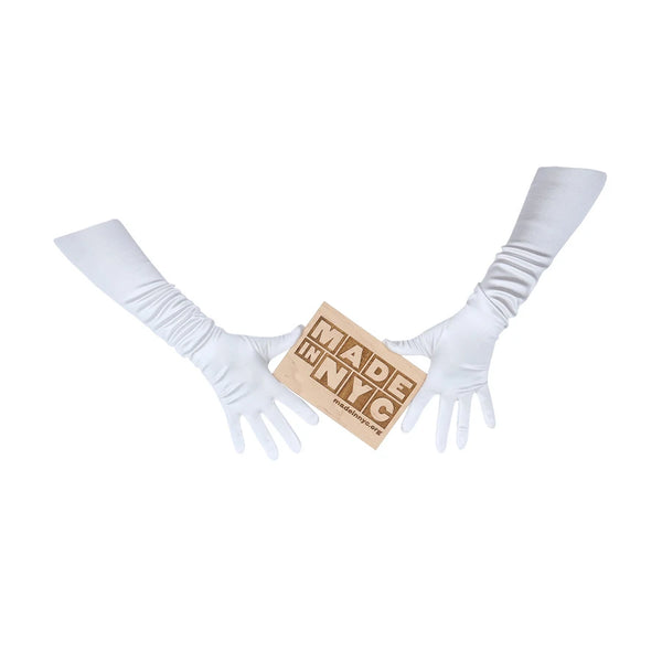 opera length satin white gloves holding wooden Made in NYC sign