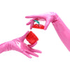 opera length vinyl pink gloves holding an apple