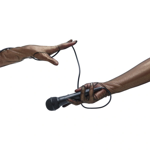 opera length metallic mesh black gold gloves using a microphone