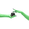 opera length green gloves sewn with black nails holding miniature skull