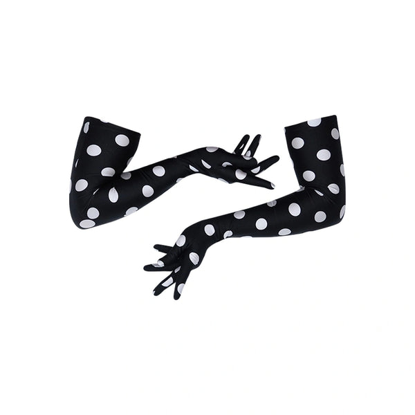 long black gloves with large white polka dots posed with scooped arms