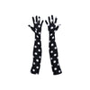 long black gloves with large white polka dots with palms facing up