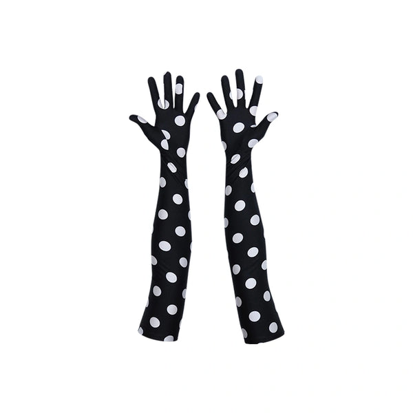 long black gloves with large white polka dots with palms facing up
