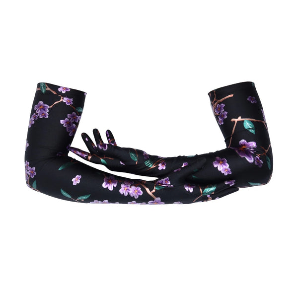 opera length black gloves with purple floral pattern with arms crossed