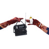 image of hands wearing illustrated outer space pattern gloves holding a mini stereo and astronaut ornament