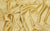 light yellow satin fabric used for luxury gloves
