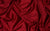 red satin fabric used for editorial gloves