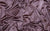 Purple swatch of smooth, two-way stretch satin fabric