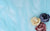 baby blue mesh fabric with flowers laid on top