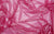 close up of fuchsia metallic mesh fabric