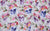 white fabric printed with flowers and skulls