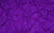 Purple spandex glove fabric sample with 4-way stretch, crafted in New York.