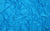 Close-up of blue spandex fabric, used for Wing & Weft’s Marilyn gloves