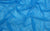 Textured blue holo dot mesh fabric swatch, used for handmade Michelle gloves