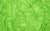 Close-up view of green fabric swatch for the Natasha glove, featuring 4-way stretch holo mini-dot spandex