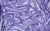 Detailed view of Natasha glove fabric swatch, featured in a purple-silver color