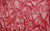 Close-up of 4-way stretch holo mini-dot spandex fabric swatch, the base material for the Natasha glove
