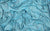 turquoise fabric swatch of 4-way stretch spandex