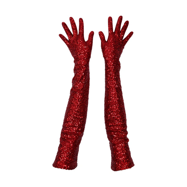 Close-up of Wing + Weft Vera gloves, worn by a model and made from 4-way stretch red sequin fabric