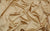 Gold Italian satin fabric with subtle sheen, used in handmade gloves that reflect Sarah Jessica Parker