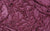 Mauve fabric swatch of 4-way stretch knit with sequins