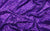 A shimmering purple sequin swatch, used in bold and elegant custom gloves