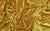 Golden velour fabric with a velvety finish, designed for high-fashion gloves.