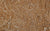 A creamy, mocha velour fabric sample with a soft, elegant feel, used for timeless gloves.