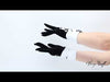 video of a model wearing the black and white Penn Station gloves