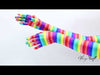 video of a model wearing the Lauren gloves in rainbow