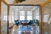 sunny office space with blue chairs