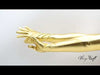 video of hands wearing the Madeline gloves in gold metallic vinyl
